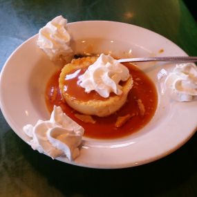 Flan-  A superb Mexican custard made fresh in house . Also featuring these desserts -all built to share 			Sopapillas, Bread Pudding, Fried Ice Cream, Flan, Mudd Pie, Margarita Lime Pie, Brownie	Sundae or Ice Cream Nachos.