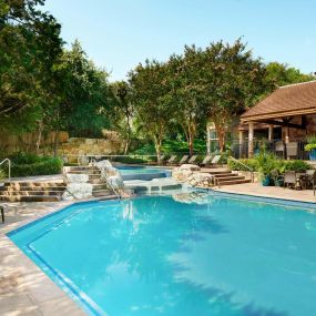 Pool with water feature and sundeck