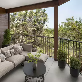 Large private balcony overlooking greenspace at Camden Gaines Ranch apartments in Austin, TX