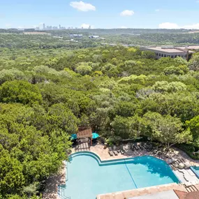 View of pool at Camden Gaines Ranch and surrounding greenbelt