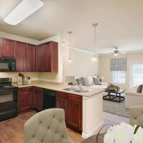 Open kitchen dining leading into large living room