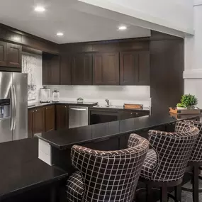 Resident lounge with entertaining kitchen at Camden Yorktown Apartments in Houston, TX