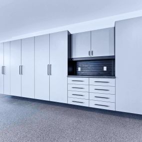 PremierGarage cabinets paired with our exclusive PremierOne Epoxy Floor Coating.