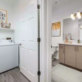 Luxurious bathroom and full-size washer and dryer at Camden Landmark Apartments in Ontario CA