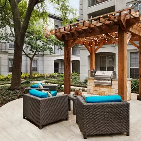 Outdoor grilling area with seating