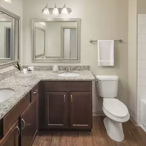 Bathroom with double sink vanity at Camden Midtown Apartments in Houston, TX