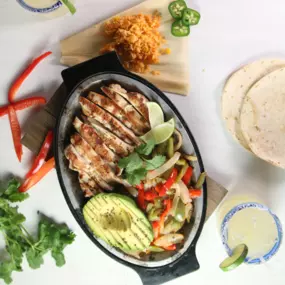 Sizzling hot, juicy, and full of flavor! That's what our Fajitas are all about.