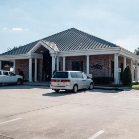 Exterior front entrance of credit union in Friendswood