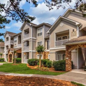 Building exterior showing exterior stairwells and private balconies