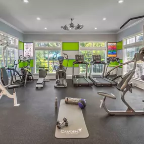 Fitness center with cardio and strength training equipment