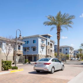 Camden Chandler Apartments Chandler AZ gate with car driving through