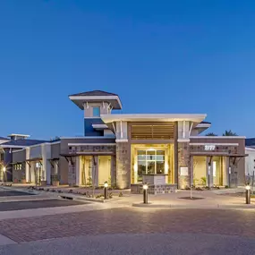 Leasing office lit up at dusk