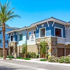 Courtyard style building with attached garages