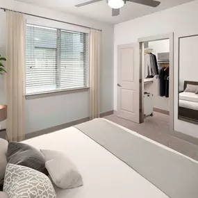 Bedroom with walk-in closet and ceiling fan