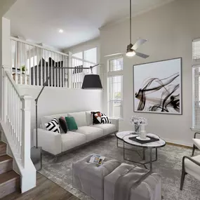 Townhome living room with stairs to kitchen