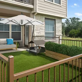 Large, private, fenced yard attached to a first-floor patio