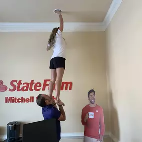 In this office we are very resourceful! When we have a lightbulb out but do not have a ladder tall enough to reach, Mitchell, Cassidy, and Jake get the job DONE!