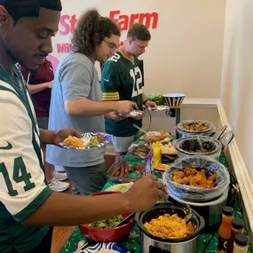 What do you do in an office full of competitive people? You have an office fantasy football league, of course! And what's a draft party without tailgate food? Rumor has it, it was one of the 