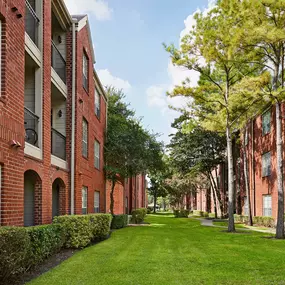 Green landscaped courtyard walking trail