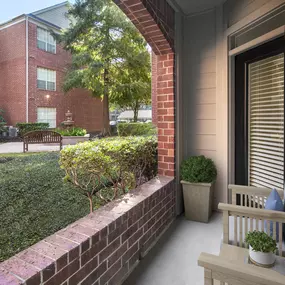 Patio with seating overlooking the courtyard