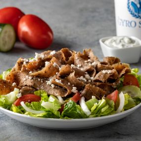 Original Salad - Romaine lettuce, cucumbers, onions, tomatoes, gyro meat and choice of dressing on the side.