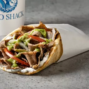 Spicy -  Gyro meat, tzatziki sauce, tomato, onion & spicy sauce.