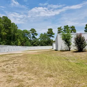 Wide aisles, large storage units, and drive-up access make boat and RV storage easy and convenient at Cap'n Tom's Storage in Willis, TX.