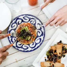 People eating a tostada