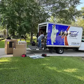 Air Tech of Conroe van unloading