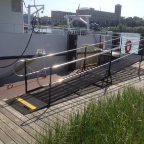 Doug Draeger and the Amramp Michigan team recently installed a wheelchair ramp for the Grand Valley State University water research vessel W. G. Jackson on Lake Michigan. The wheelchair ramp allows all passengers to safely board the vessel for summer tours.