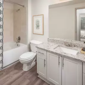 Bathroom with stand up shower and large soaking bathtub