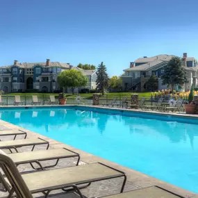 Pool with deck chairs