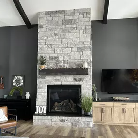 large fire place in home after stone installation from Exterpro