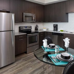 Open kitchen with subway tile backsplash