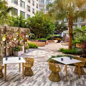 Zen garden with comfortable seating and hanging plants