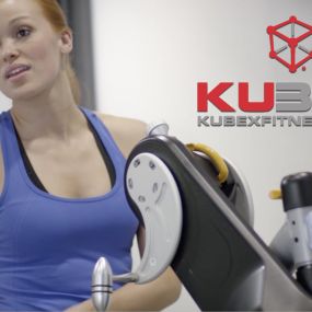 Woman working out at Kubex Fitness