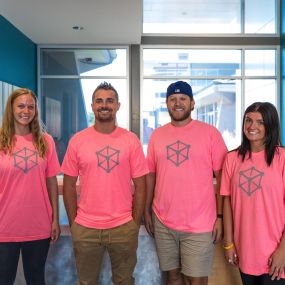 Kubex team wearing breast cancer awareness tshirts.