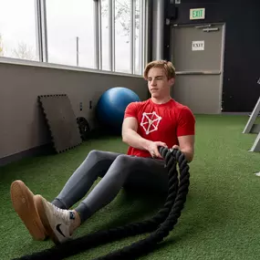 Person using battle ropes at Kubex Fitness in Logan, UT