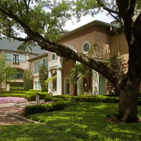 Leasing office exterior with green space at Camden Greenway Apartments in Houston, TX