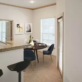 Dining area with door to private balcony at Camden Greenway Apartments in Houston, TX