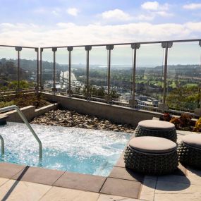 Camden Hillcrest Apartments San Diego CA infinity edge hot tub on a cliff looking out toward the ocean