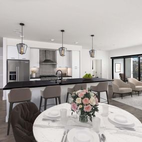 Camden Hillcrest apartments san diego ca open concept dining and living area with premier finishes in the kitchen including designer pendant lighting and kitchenaid appliances