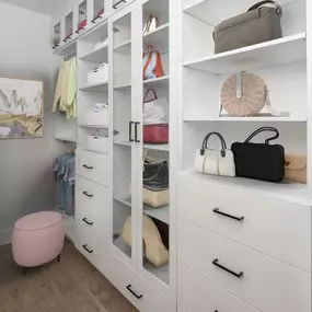 Camden Hillcrest apartments san diego ca custom walk-in closet with built in wooden shelves and glass enclosed cabinets