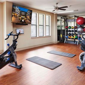 Fitness center at Camden Belmont Apartments
