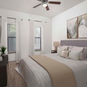 Modern-style bedroom with wood-style floors at Camden Belmont apartments in Dallas, Tx