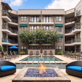 Resort style pool with firepit