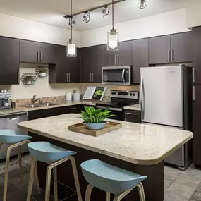 Contemporary style kitchen with granite countertops and stainless steel appliances