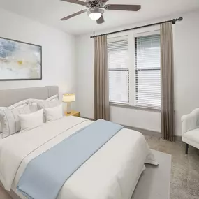 Bedroom with ceiling fan and carpet flooring