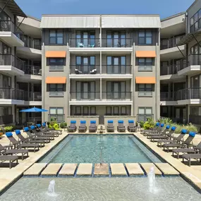 Resort-style pool and sundeck at Camden Belmont apartments in Dallas, TX