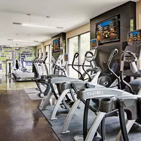 24 hour fitness center with treadmills elliptical machines and stationary bikes